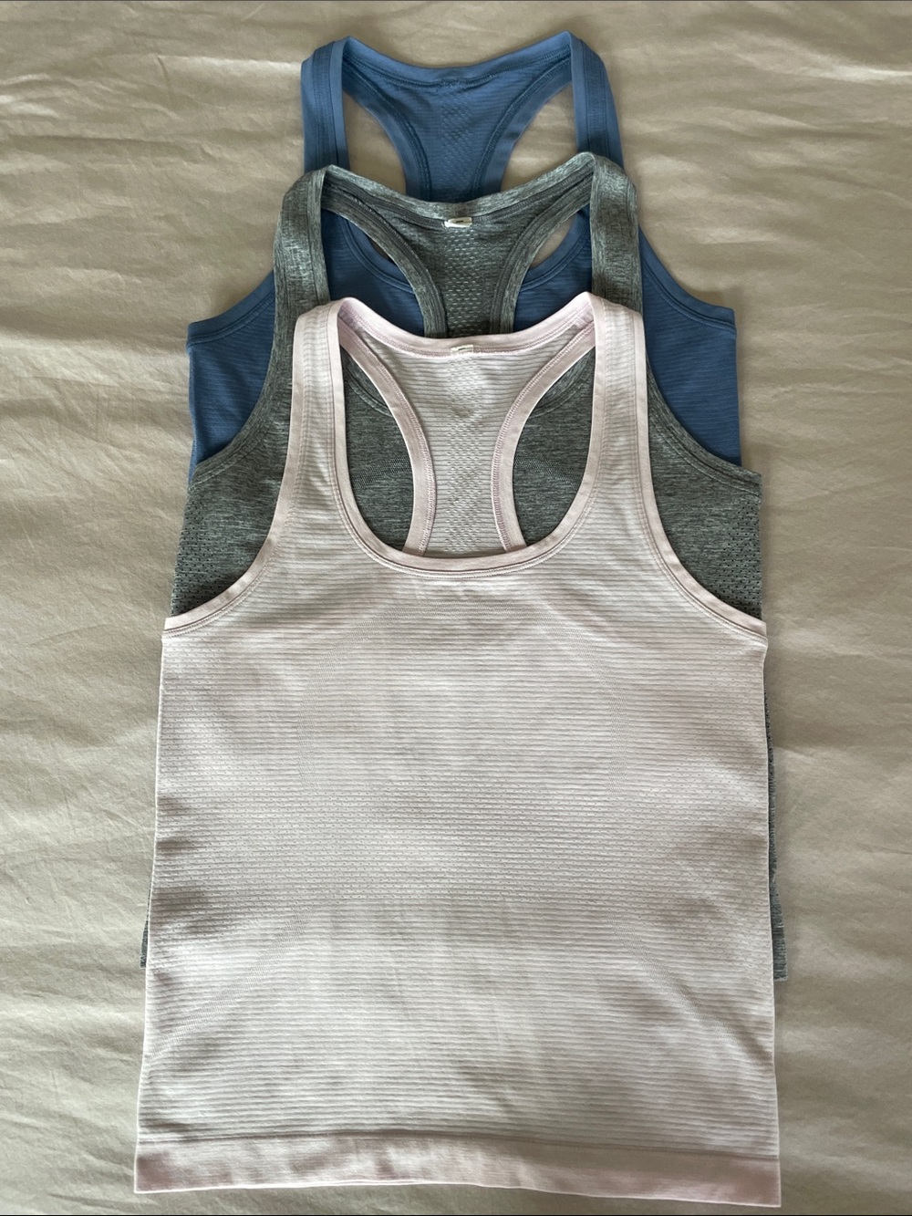 LuluLemon “Swiftly” tanks, set of 3